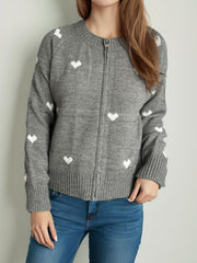 Gray zip-through knit cardigan with white heart print, crew neck, long sleeves, ribbed cuffs and hem.