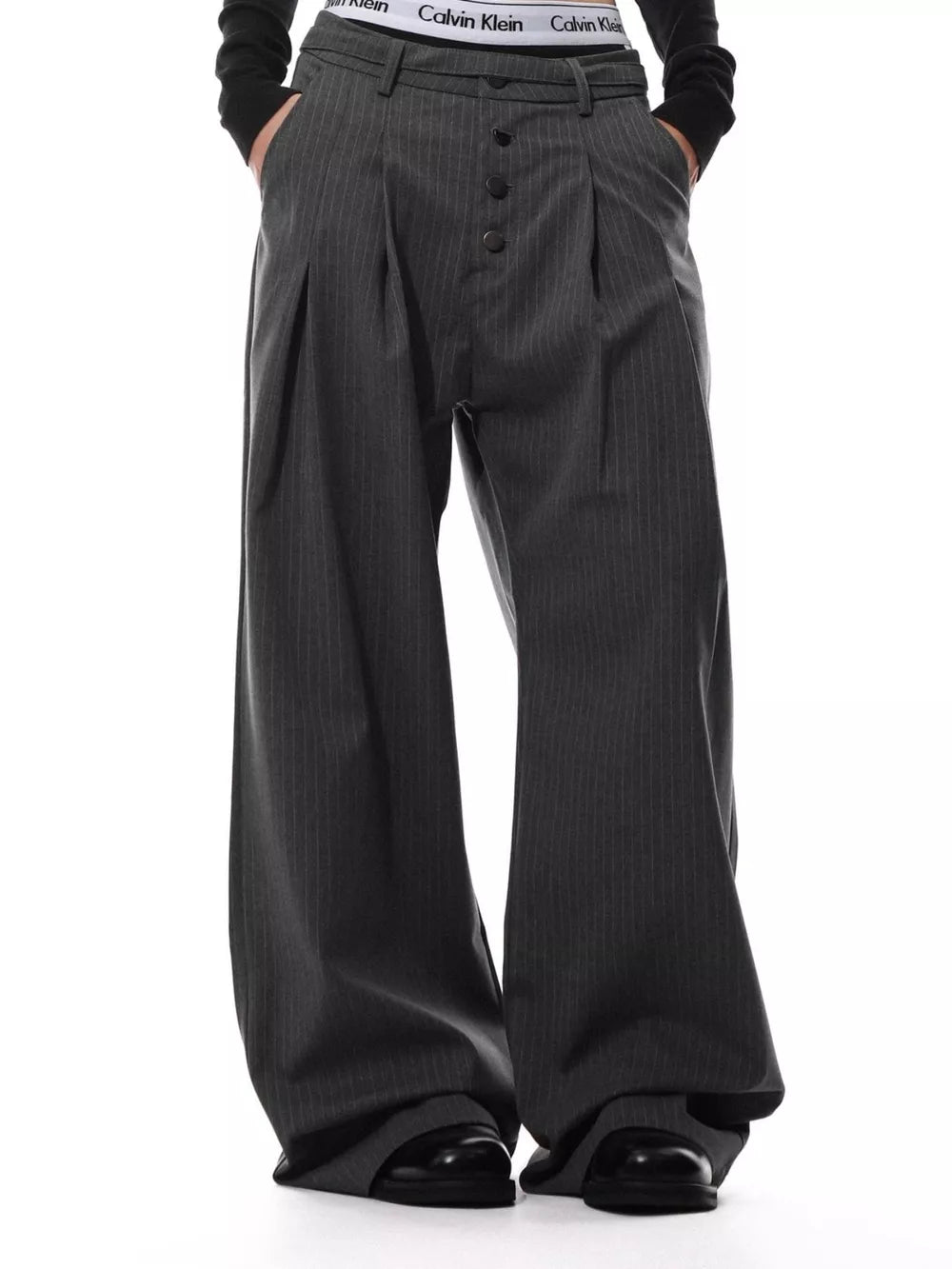 Charcoal pinstripe wide-leg maternity trousers with button-front detail.
