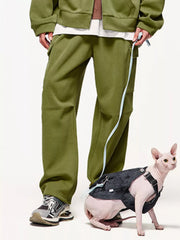 Men's relaxed fit moss cargo pants with side pockets and light blue trim detail.
