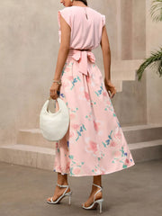 Pink floral print midi skirt with a matching structured top and tie waist.