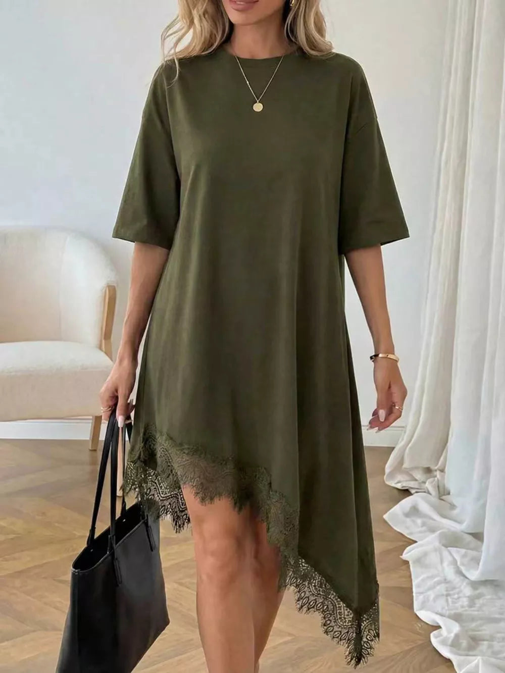 Army green t-shirt dress with asymmetrical hem and lace trim