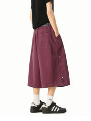 Relaxed fit purple cargo shorts with utility pockets and a below-knee length.