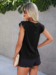 Black cotton eyelet yoke flutter sleeve top with a round neckline.