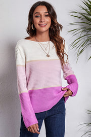 Colorblock ribbed boatneck sweater in pink and white acrylic with long sleeves.