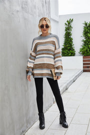 Multicolor horizontal stripe knit sweater with balloon sleeves and crew neck.