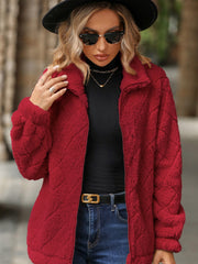 Textured teddy zip-up jacket in deep red with a diamond pattern, long sleeves, and a stand-up collar.
