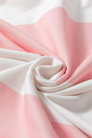 Striped sweatshirt in blush pink and white with a soft knit texture.