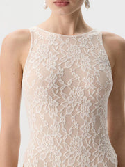 Sheer lace tank top in beige with floral pattern and high neckline.
