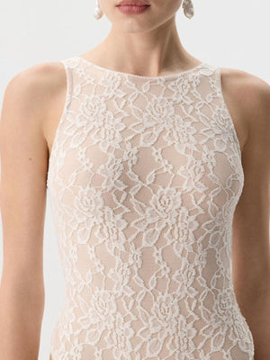 Sheer lace tank top in beige with floral pattern and high neckline.