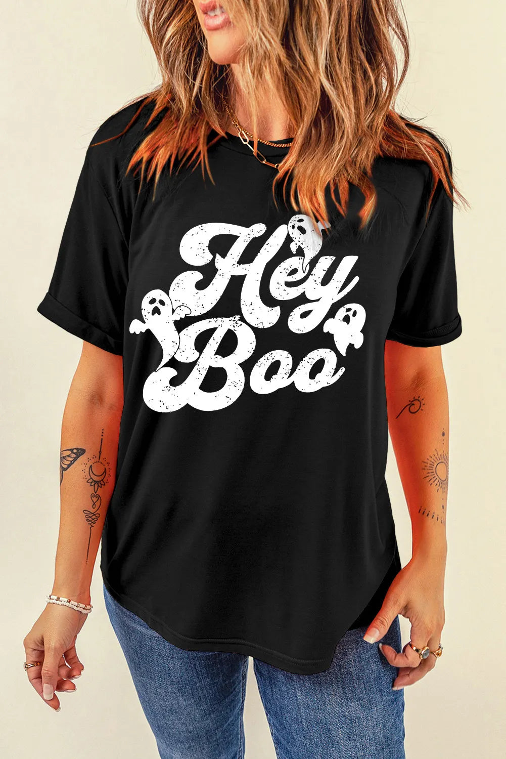 Black graphic tee with white distressed "Hey Boo" text and ghost details.