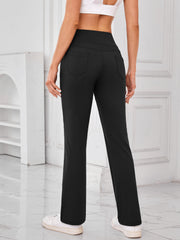 Black flared activewear pants with pocket detail
