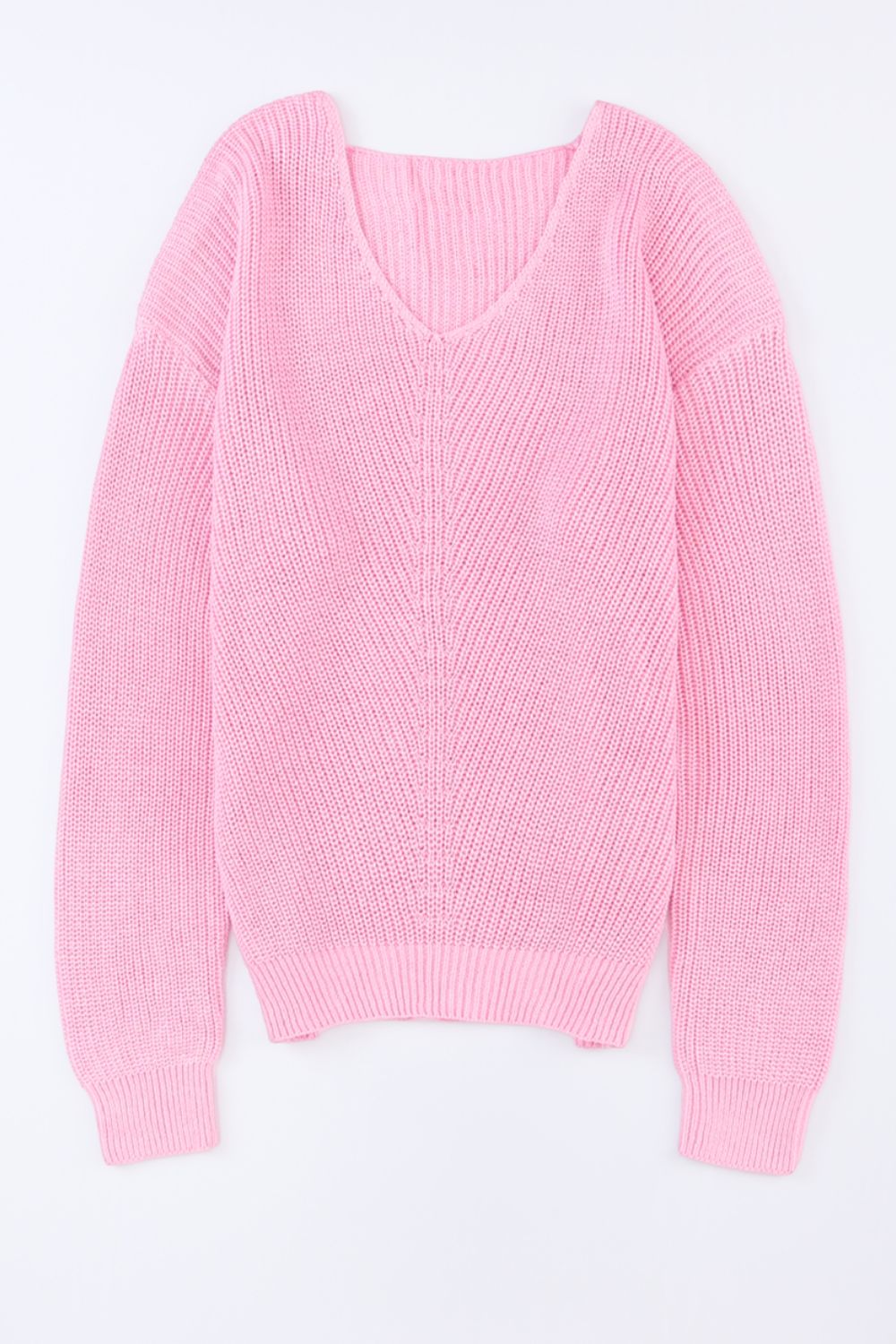 Relaxed knit v-neck pullover sweater in blush pink acrylic with chevron stitch detail.