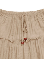 Tiered maxi skirt in tan with drawstring waist and wooden beads.
