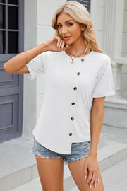 White asymmetric button-up tee with short sleeves and a rounded neckline.