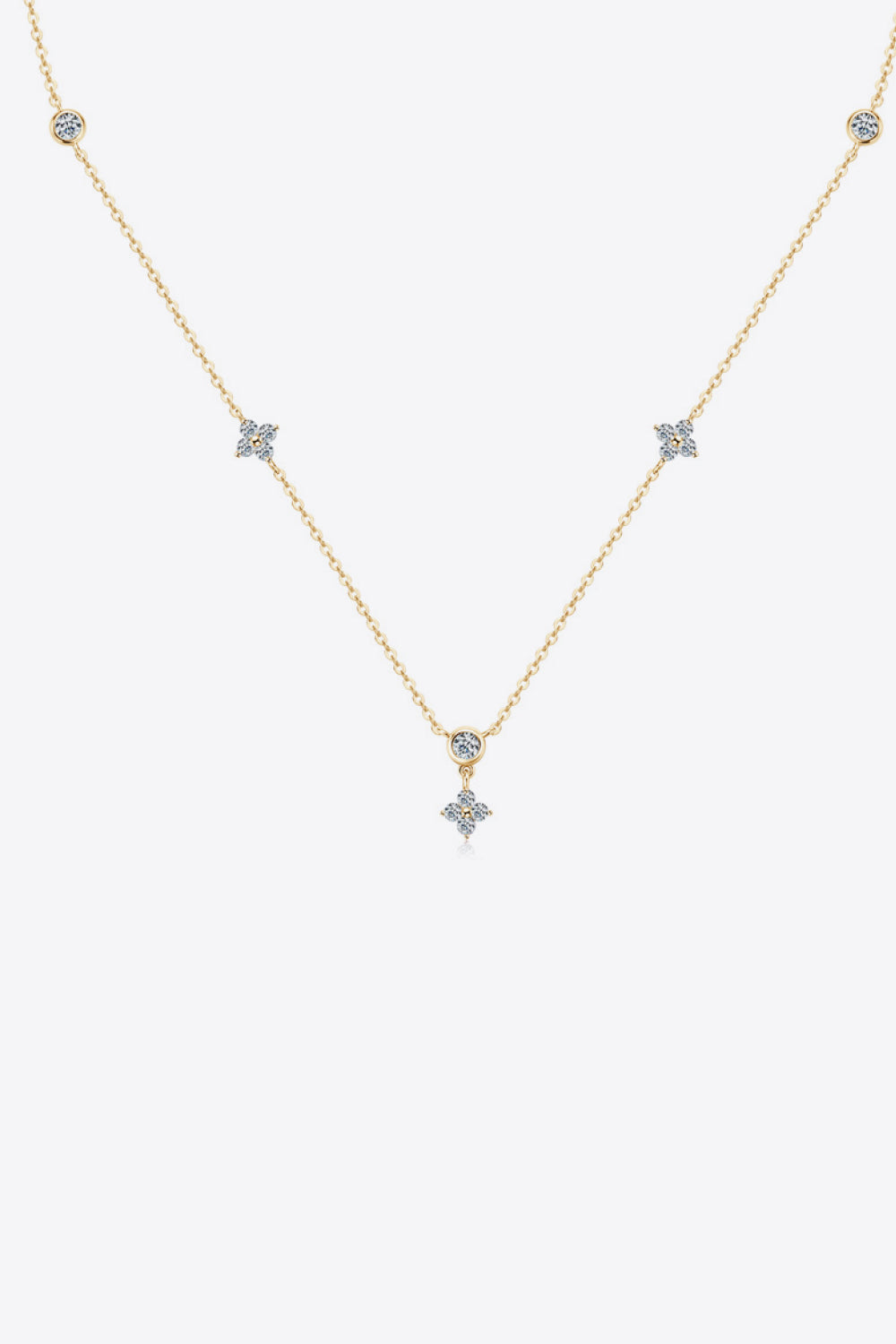 Gold necklace with diamond clusters and bezel-set diamonds