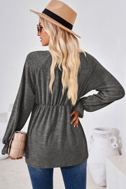 Dark Gray long sleeve blouse with cinched waist and balloon sleeves.