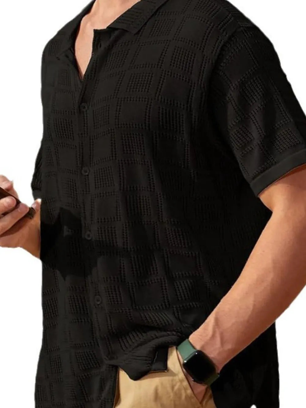 Black open-knit resort shirt with geometric texture, button-down collar, and short sleeves.