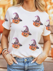 White cotton t-shirt with allover sparkling pumpkin witch graphic print