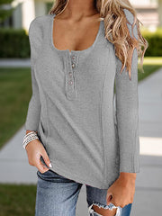 Gray ribbed henley scoop neck top with button detail and long sleeves.