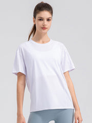 White performance t-shirt with seam details and short sleeves.