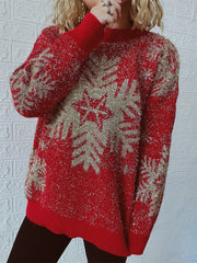 Red acrylic knit sweater with glitter snowflake pattern and crew neck.