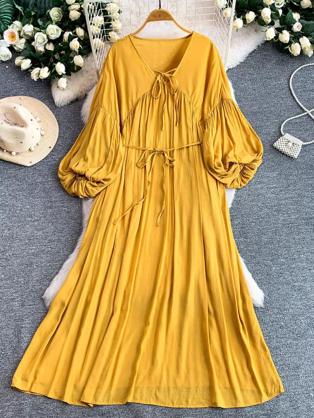 Yellow bohemian maxi dress with balloon sleeves and tie neckline