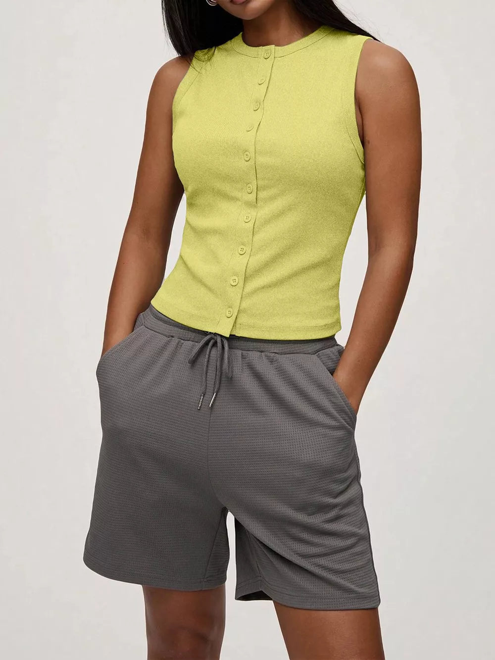 Yellow ribbed button-front fitted tank top with crew neck