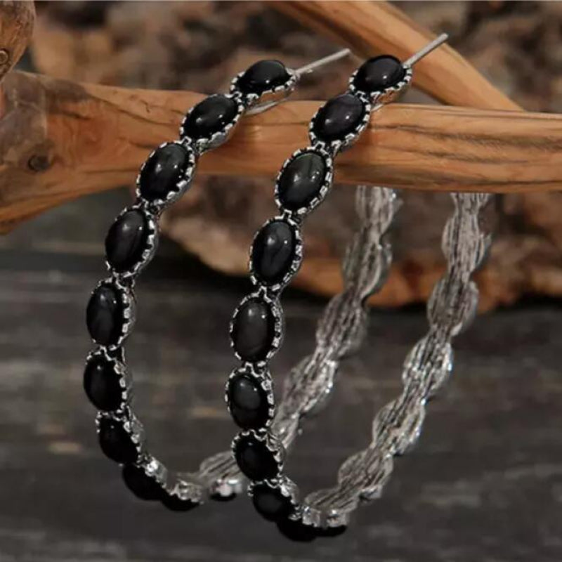Textured black stone hoop earrings with silver alloy setting and twisted detail