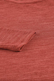 Deep Red heathered knit long sleeve top with cuffed sleeve detail.