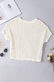 White open-knit slouchy shoulder cover-up with short sleeves and crew neck.