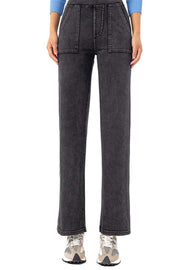 Dark wash denim jeans with utility pockets and a straight leg cut.