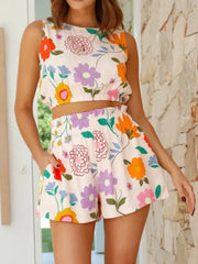 Floral crop top and shorts set with elastic waist and pockets.