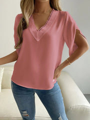 Dusty pink polyester blouse with lace V-neck and cape sleeves