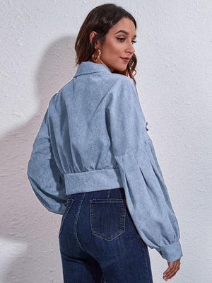 Light blue corduroy cropped jacket with balloon sleeves and button detail