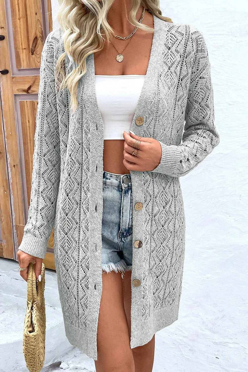 Gray diamond knit duster cardigan with button-down front and open weave detail