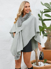 Gray faux fur collar wrap poncho with tie detail and pom-pom accent.