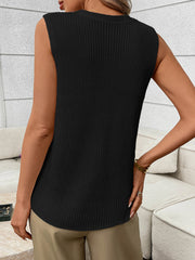 Black knit sweater vest with ribbed texture and curved hem.