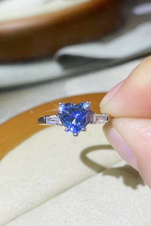 Blue heart sapphire ring in sterling silver with baguette side stones