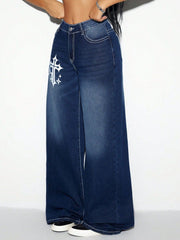 Dark wash cotton palazzo jeans with white cross graphic detail and contrast stitching.