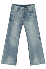 Medium wash denim bell bottom jeans with a wide leg and distressed details.