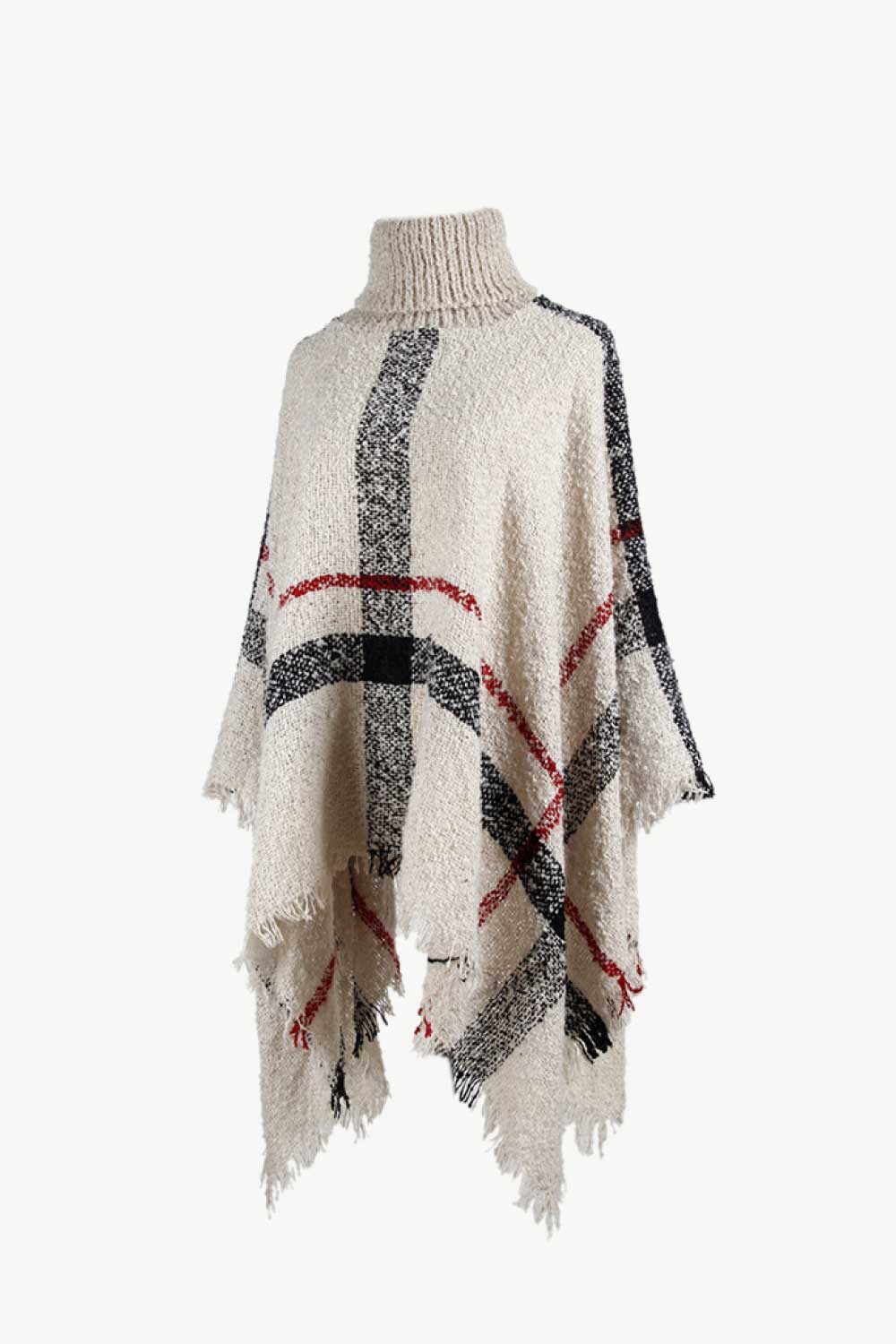 Beige plaid turtleneck cape with fringe detail and textured acrylic knit.