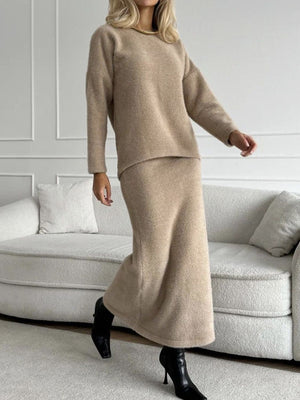 Tan textured knit co-ord set with relaxed silhouette sweater and maxi skirt.