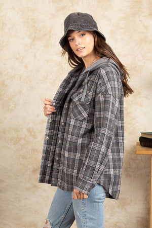 Dark Gray plaid shacket with sherpa hood and button front, styled casually.