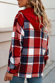 Plaid hooded shacket in red, white, and navy. Relaxed fit, casual outerwear.
