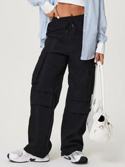 Black utility cargo pants with wide legs and multiple pockets.