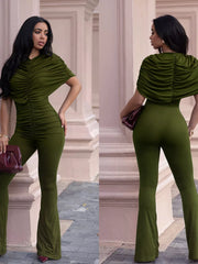 Olive green ruched romper with cap sleeves and flared legs.