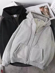 Gray fleece lined zip-up hoodie with front pockets and drawstring hood.