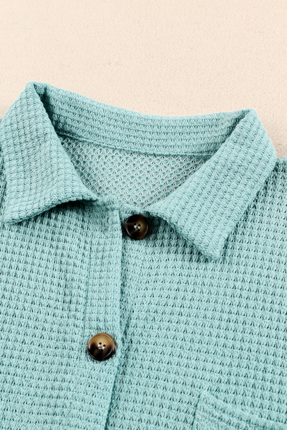Light Green waffle knit button-down shirt jacket with brown buttons.