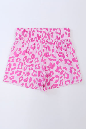 Pink leopard print shorts with elastic waistband and scalloped hem.