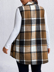Oversized plaid shirt vest in brown, black, and white, with a collared neckline and buttoned front.